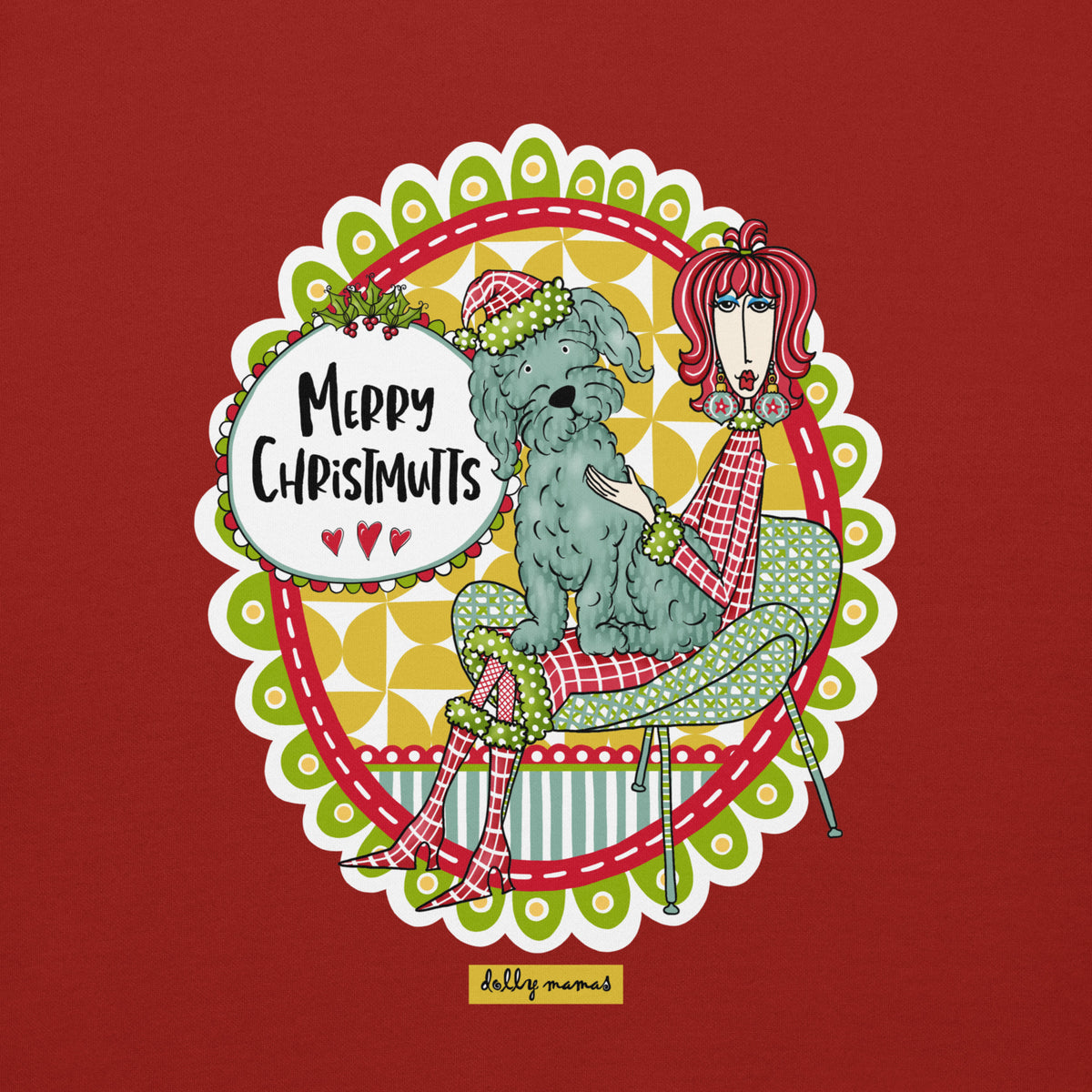 Close-up of Dolly Mamas artwork on cardinal red, showing a seated woman with a dog in a festive hat on her lap beside the words “Merry Christmutts.”