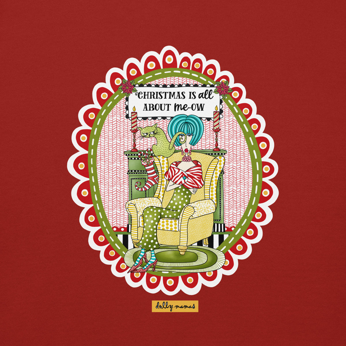 Close-up of Dolly Mamas artwork on cardinal red, featuring a seated woman, a cat, and the words “Christmas Is All About me-ow.”
