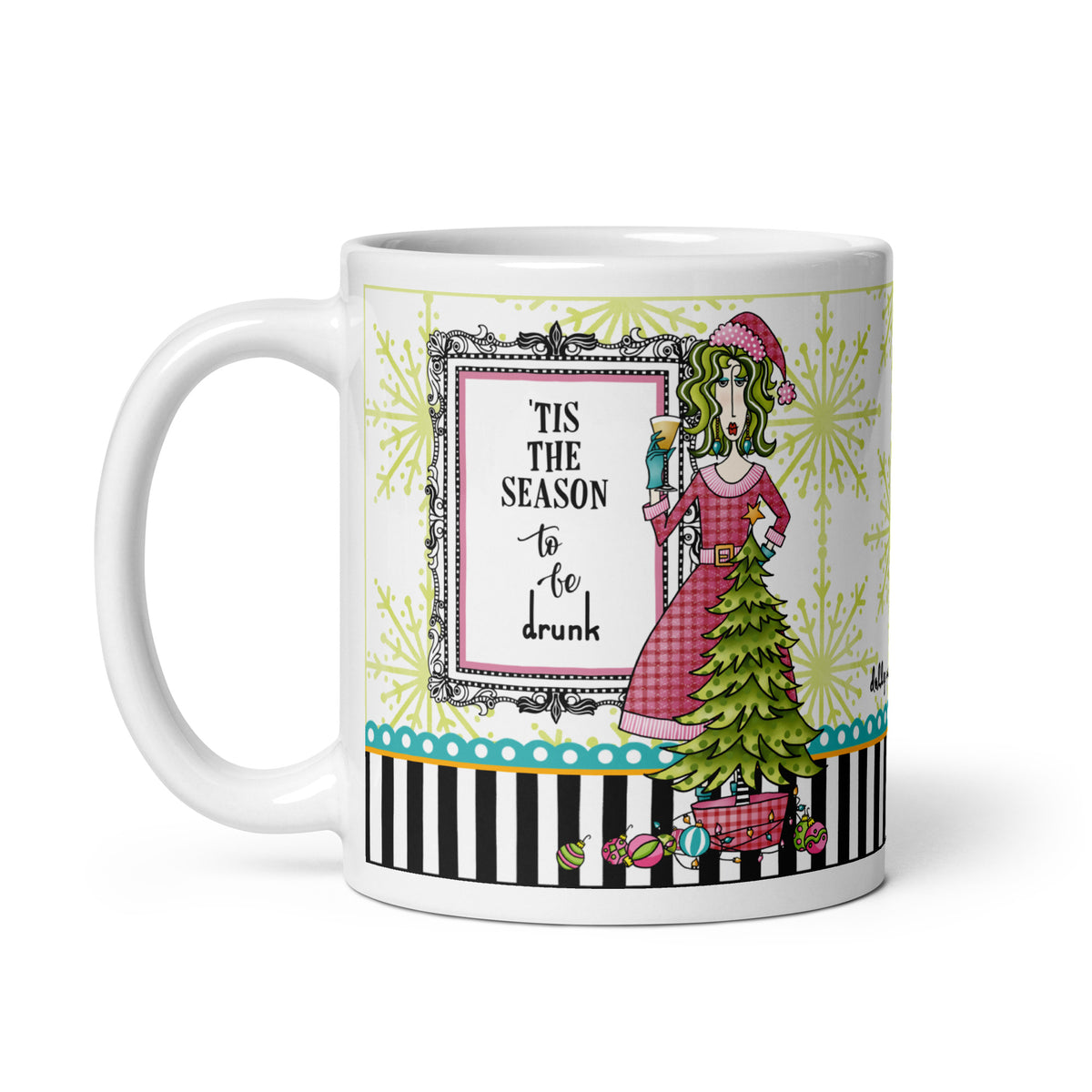 
Dolly Mama “’Tis the Season to Be Drunk” 11 oz mug featuring a woman in a pink Santa hat holding a drink beside a Christmas tree, handle left.
