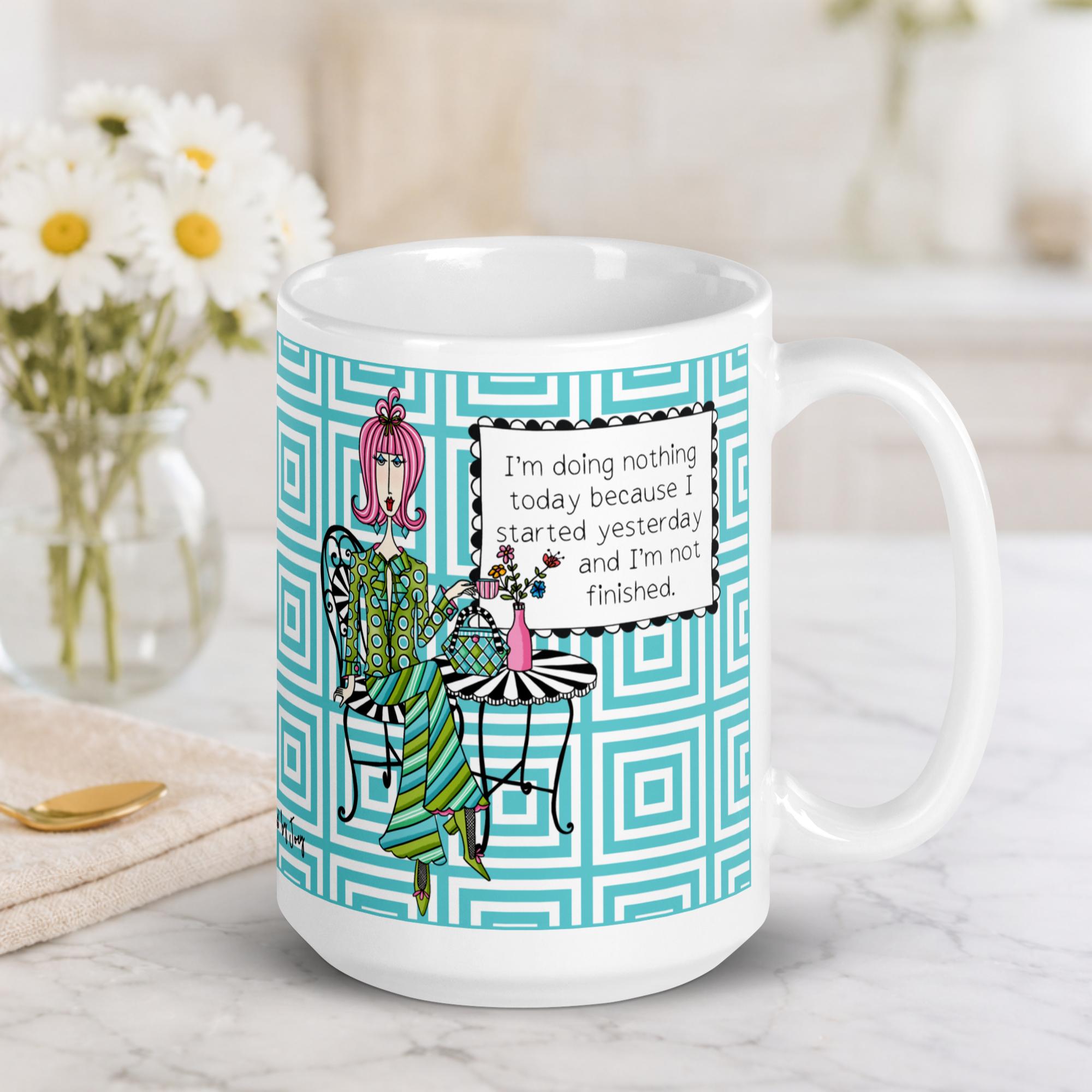 "Funny lazy day coffee mug – 'I'm doing nothing today because I started yesterday and I'm not finished' – ceramic gift mug for women and humor lovers"
